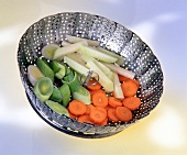 Cooked vegetables in colander
