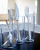 Designer cutlery in three glasses