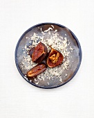 Fresh Figs with Roquefort flakes and dates on plate