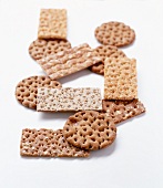 Light and dark crisp breads from wheat and rye flour on white background