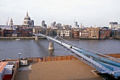 View of Millennium bridge and river Thames in London, UK