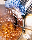 Close-up of pearl onions being steamed