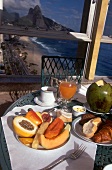 Table set with breads, fruits, beverage and juice in Hotel Caesar Park on Ipanema beach