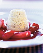 Close-up of souffle with pears in red wine on plate