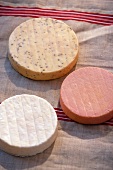 Close-up of three thick slices of French cheese