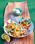 Couscous with vegetables on plate