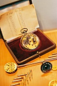 Old gold pocket watch with mounting parts
