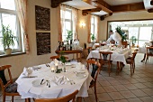 Tables laid in restaurant, Germany