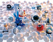 Several eggs with various alarm clocks