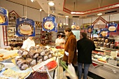 People buying goods in store, Germany