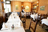 Tables laid in restaurant, Germany