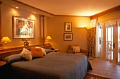 Illumintaed bedroom of Hotel Royal Palm, Mauritius
