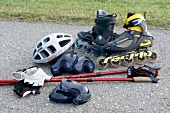 Nordic blading equipments - inline skates, poles, helmet, knee caps, gloves and glasses