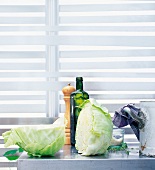 Halved cabbage on table