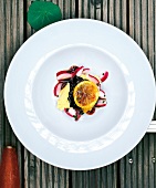 Veal cheeks with radish and lemon puree on plate, overhead view