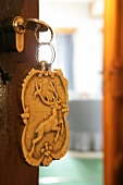 Close-up of keychain with deer motif