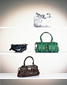 Vier verschiedene Designer-Taschen, Handtaschen