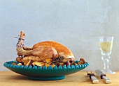 Roasted bresse chicken on serving dish