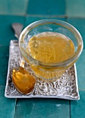 Close-up of gewurztraminer jam in glass bowl and spoon