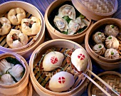 Various types of dumplings stuffed with seafood and meat