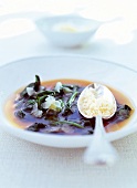 Close-up of spinach soup with garlic and parmesan cheese in bowl