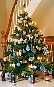 Christmas tree decorated in white and blue