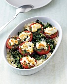 Spinach rice with baked tomatoes in bowl