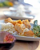 Close-up of mackerel and rice on plate