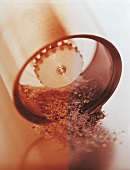 Close-up of pepper powder on pepper mill