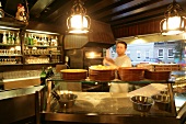 Food display counter in restaurant, Germany