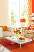 Bright living room with furniture and decors in orange tone