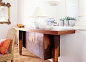 Dining room with sideboard, wicker chair and mirror