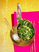 Sauteed string beans with curry leaves in bowl