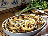 Pasta gratin with vegetables in serving dish