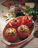 Peppers stuffed with bread and anchovies on tray