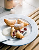 Choux pastry with cinnamon sabayon on plate