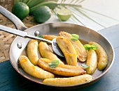 Close-up of fried bananas in pan