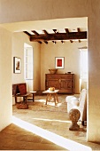 Living room with wooden furniture and stone floorings