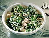 Close-up of turkey breast with beans in bowl
