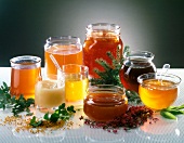 Various varieties of honey in glass jars