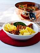 Pappardelle with lamb ragout in bowl