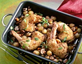 Chicken with red wine in pan