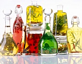 Various bottles of home made oil and vinegar