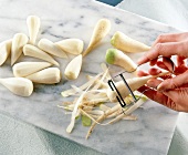 Peeling beets with vegetable peeler