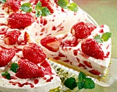 Close-up of strawberry cake with curd cream
