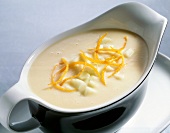 Horseradish sauce with apples and cream in serving dish