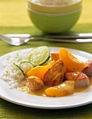 Turkey curry with apricots on plate