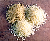 Close-up of brown rice, long grain rice and round grain rice