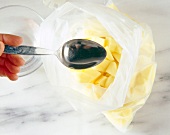 Close-up of diced potatoes in plastic bag