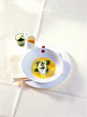 Rice ice cream with avocado, passion fruit and basil in serving bowl